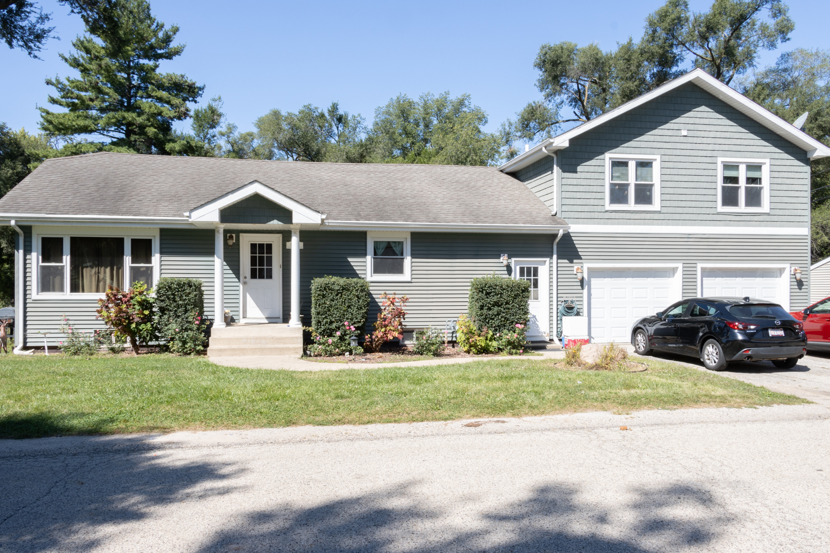 a house view with a garden space