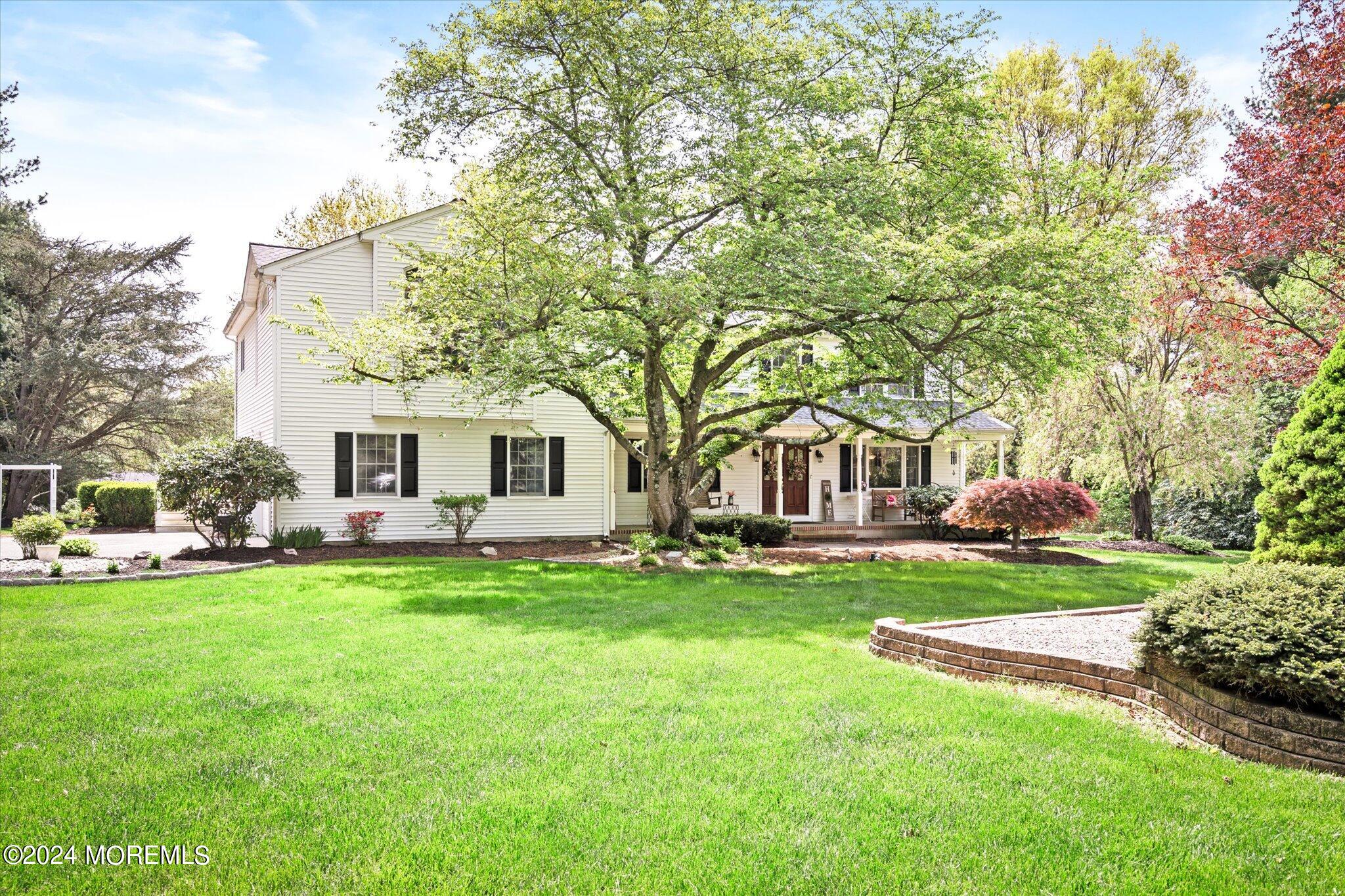 a view of a house with a back yard