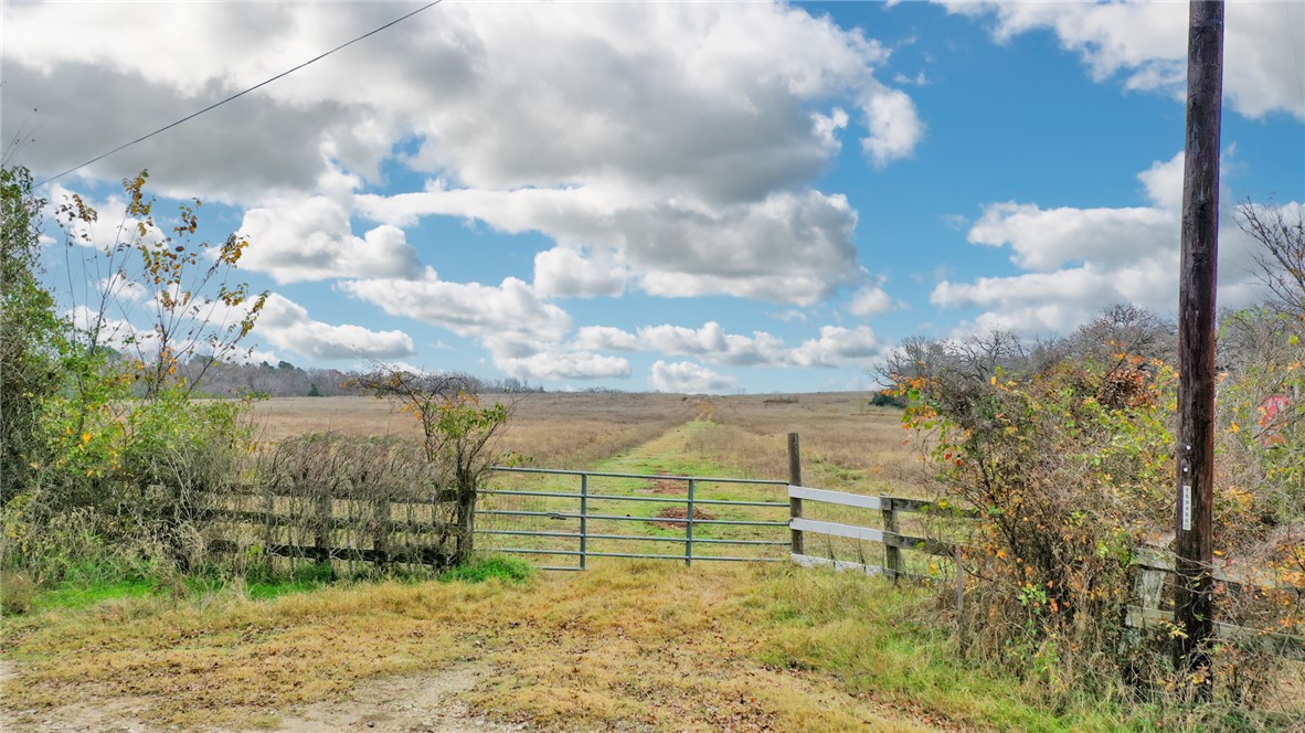 View of gate featuring a rural view