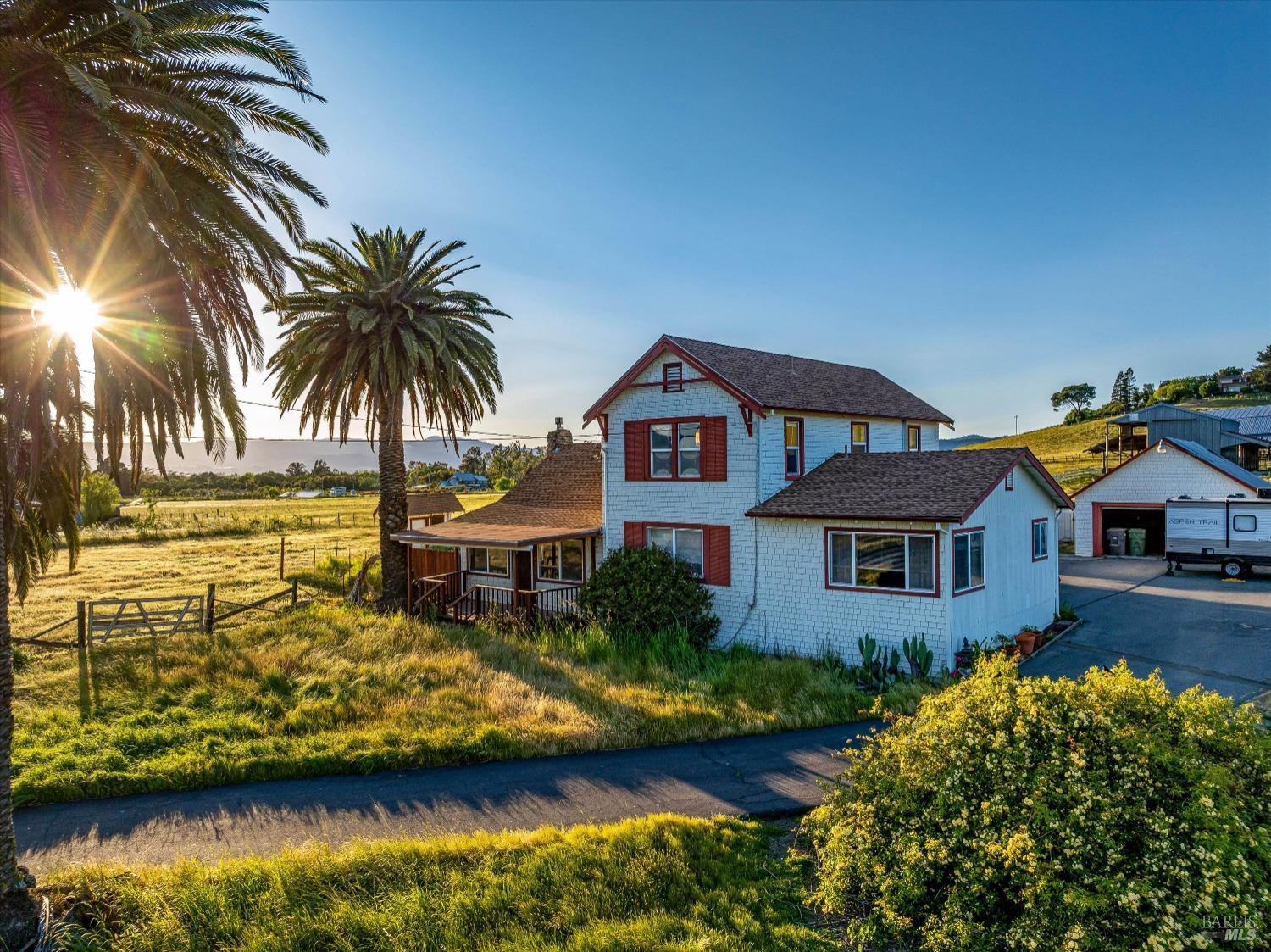 a view of a house with a ocean view