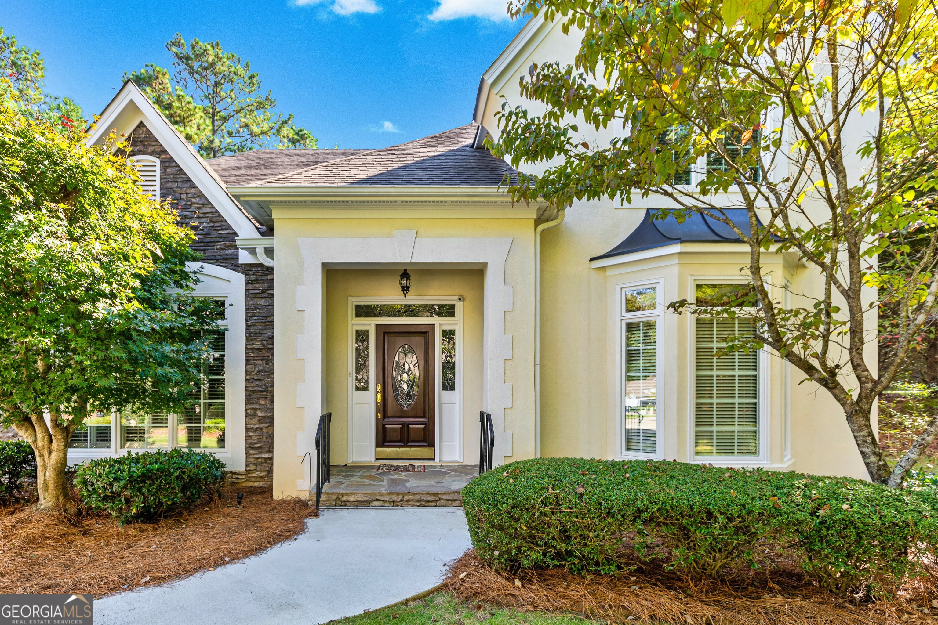 a front view of a house with a porch