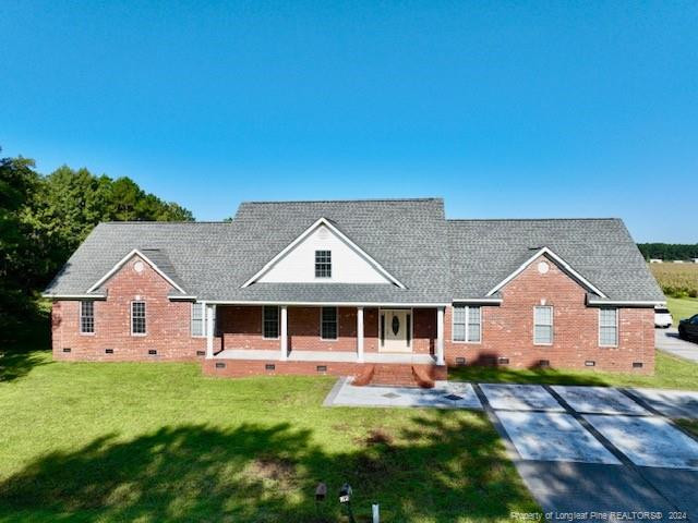 a view of a house with a big yard