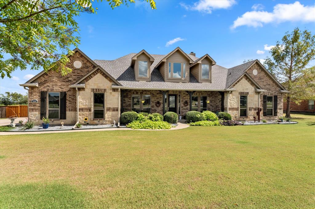 a front view of a house with swimming pool