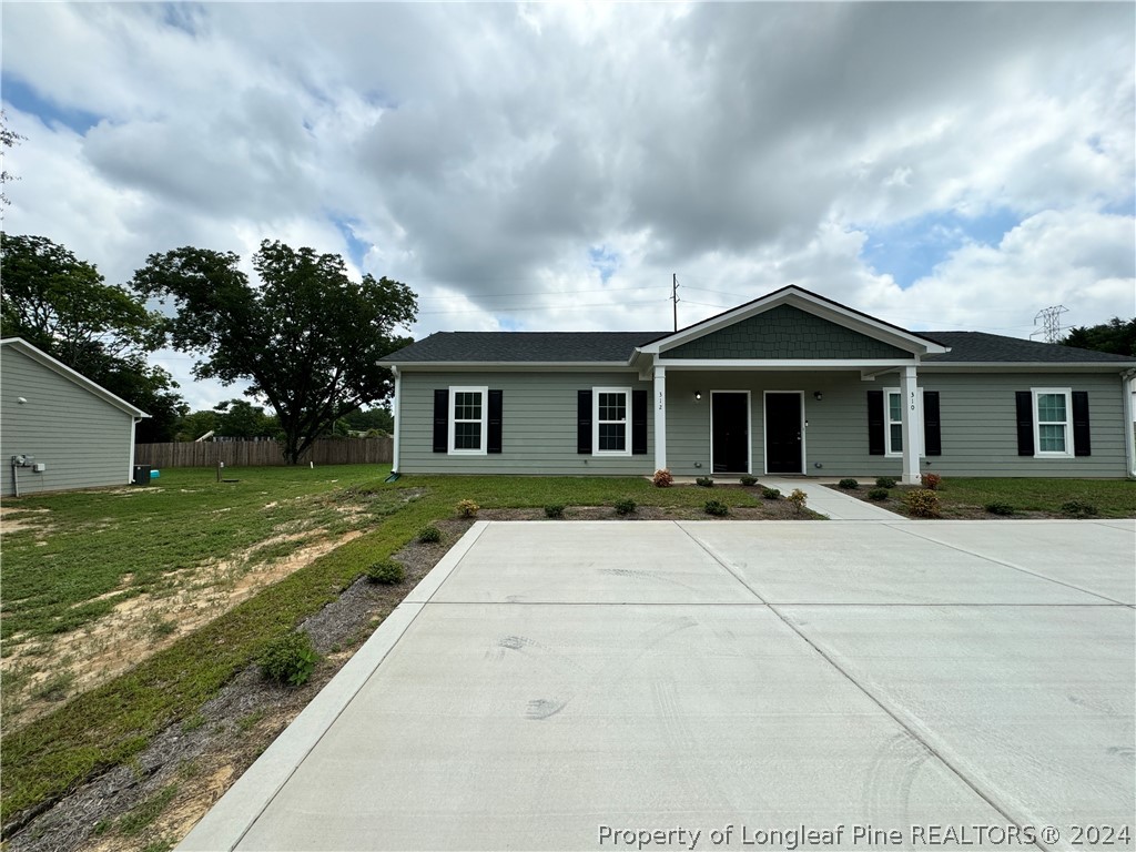 front view of house with a yard