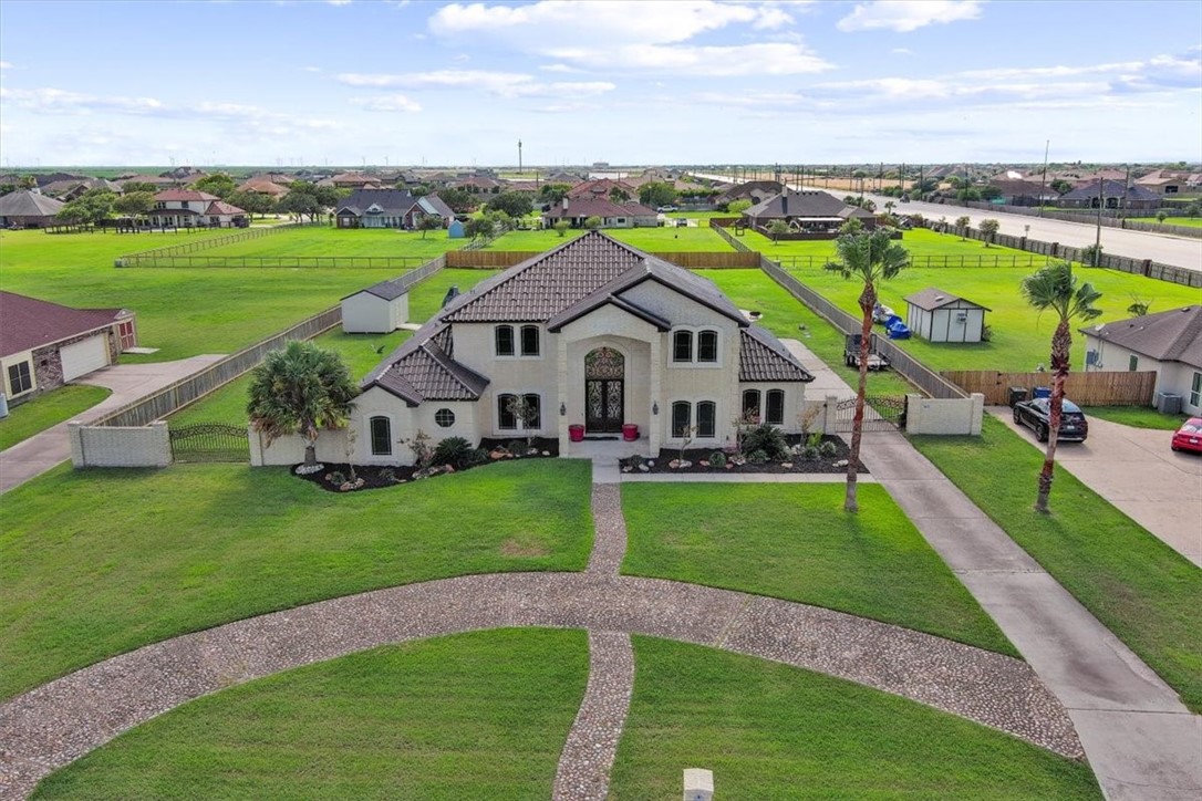 a view of a house with a big yard