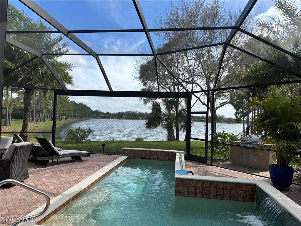 a view of a swimming pool with a patio