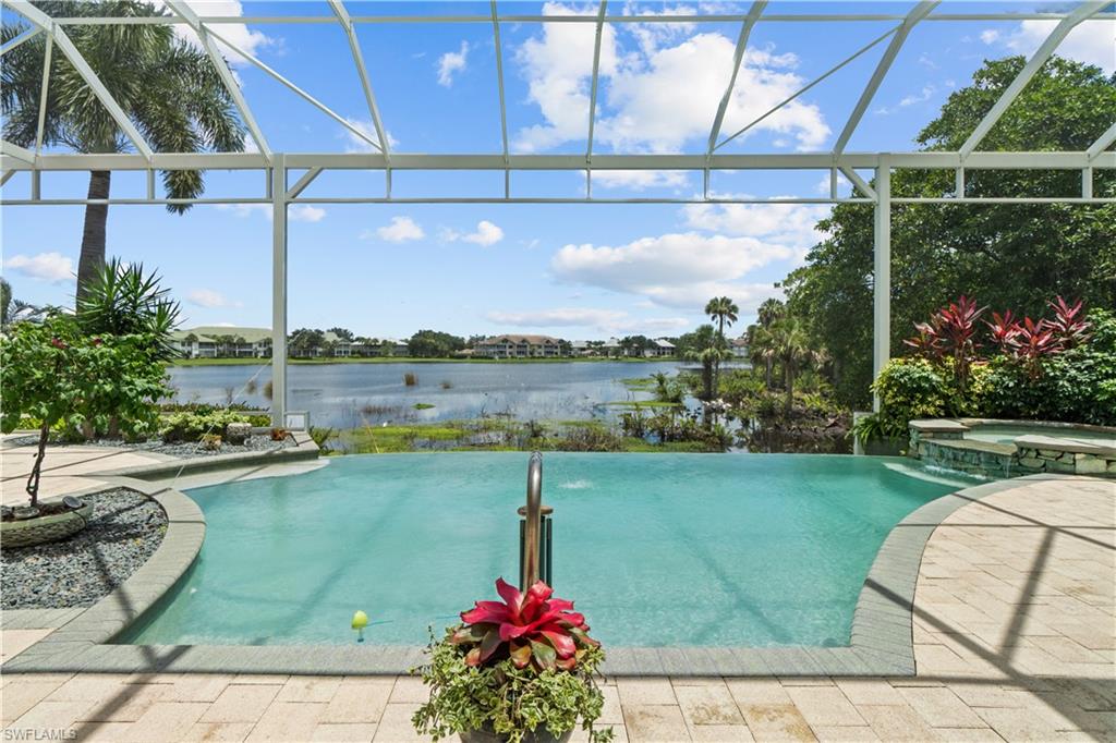 a view of a swimming pool with a patio