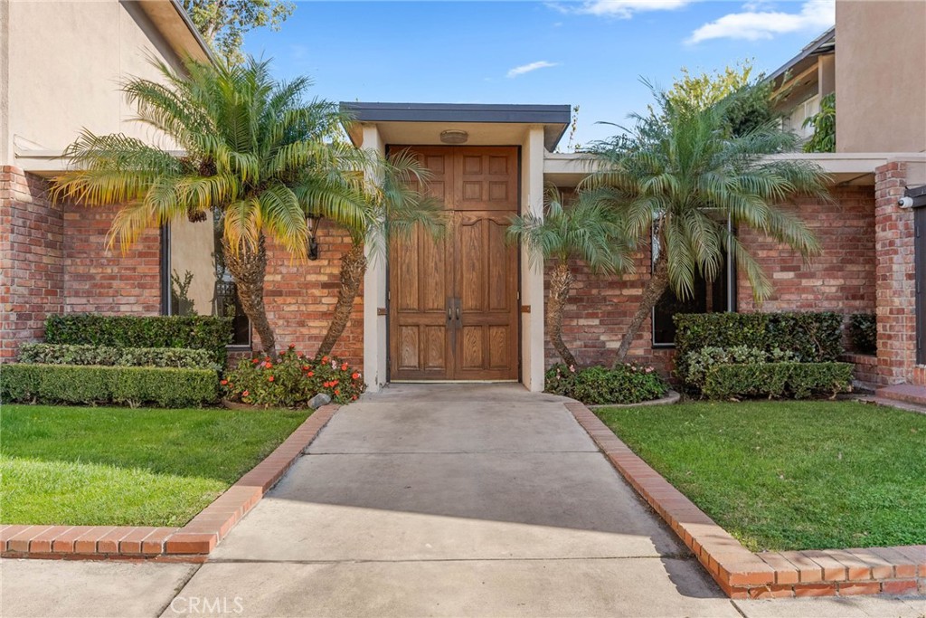 a front view of a house having yard