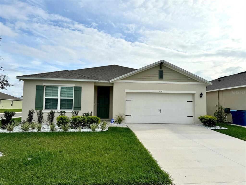 a front view of house with yard