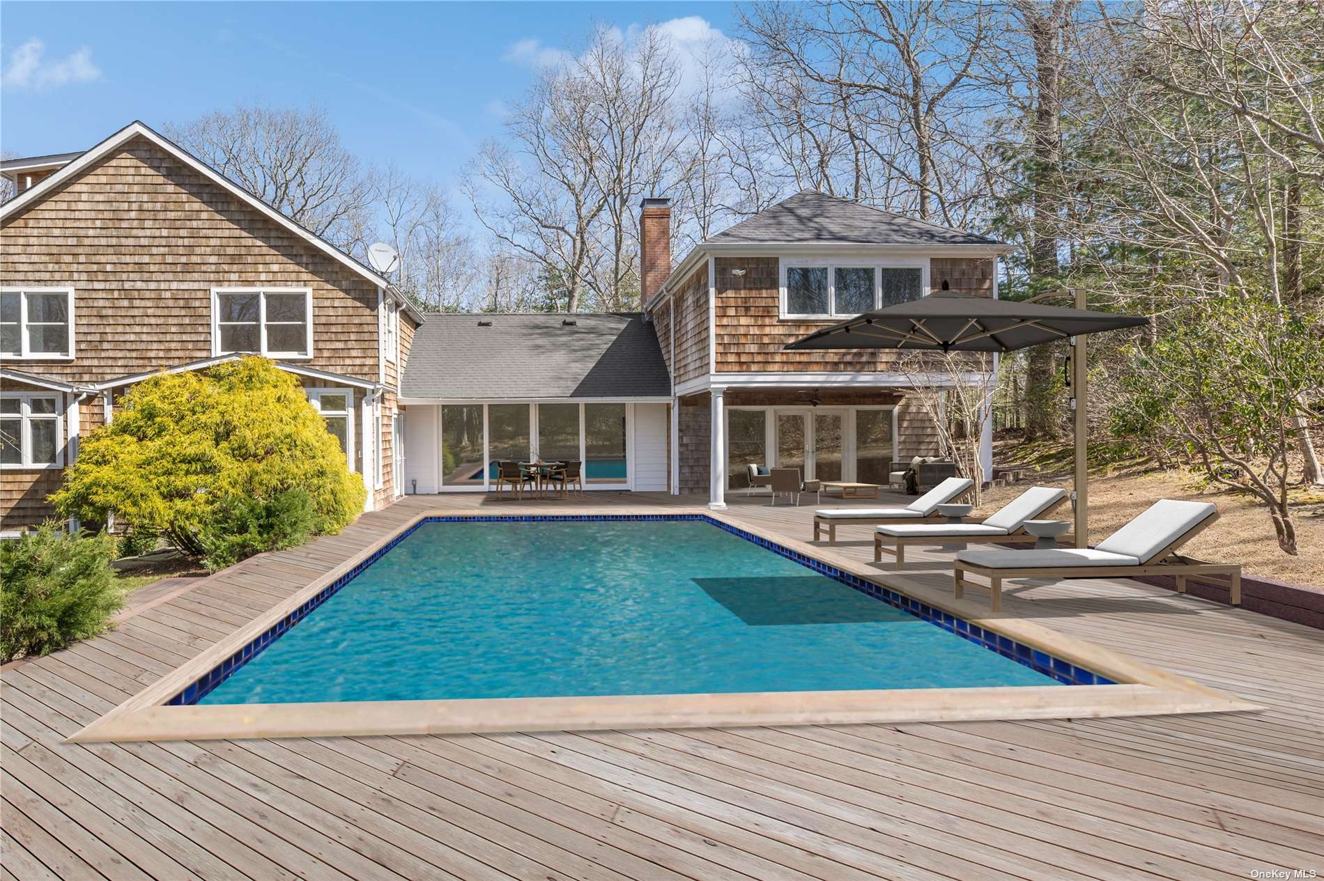 a front view of a house with swimming pool