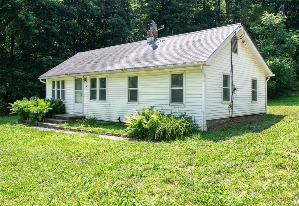 a view of a house with garden