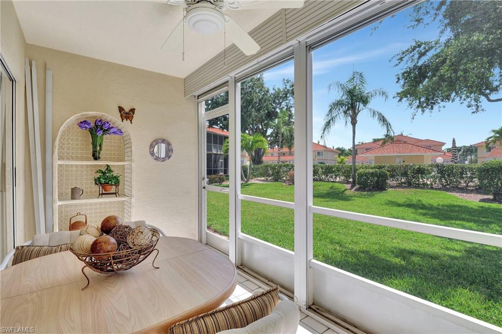 Sunroom with ceiling fan and a wealth of natural light