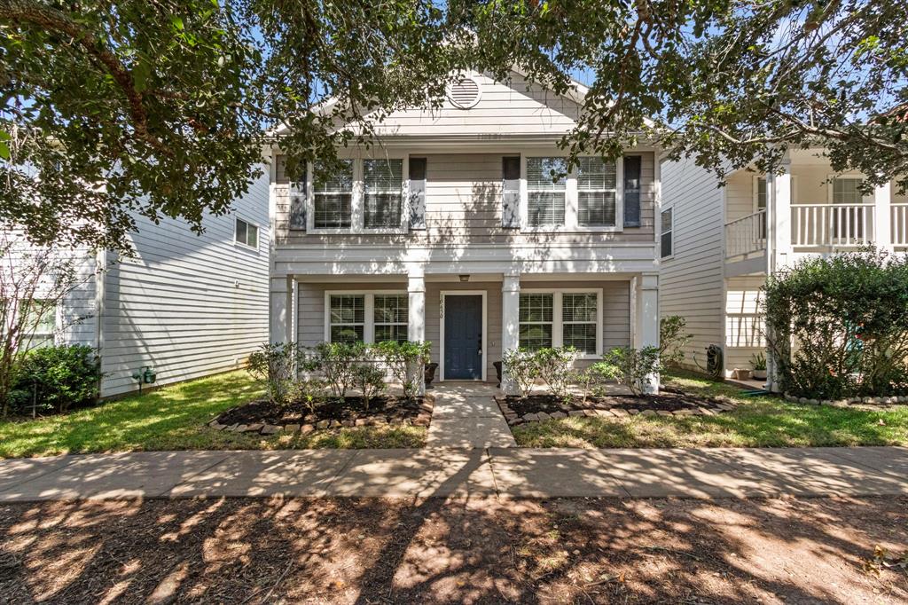 Charming home located in the Steep Bank Village section of Sienna Plantation. This home faces a green space in front with a garage and parking in back. This home is completely move-in ready with neutral colors and a large deck for outside enjoyment.