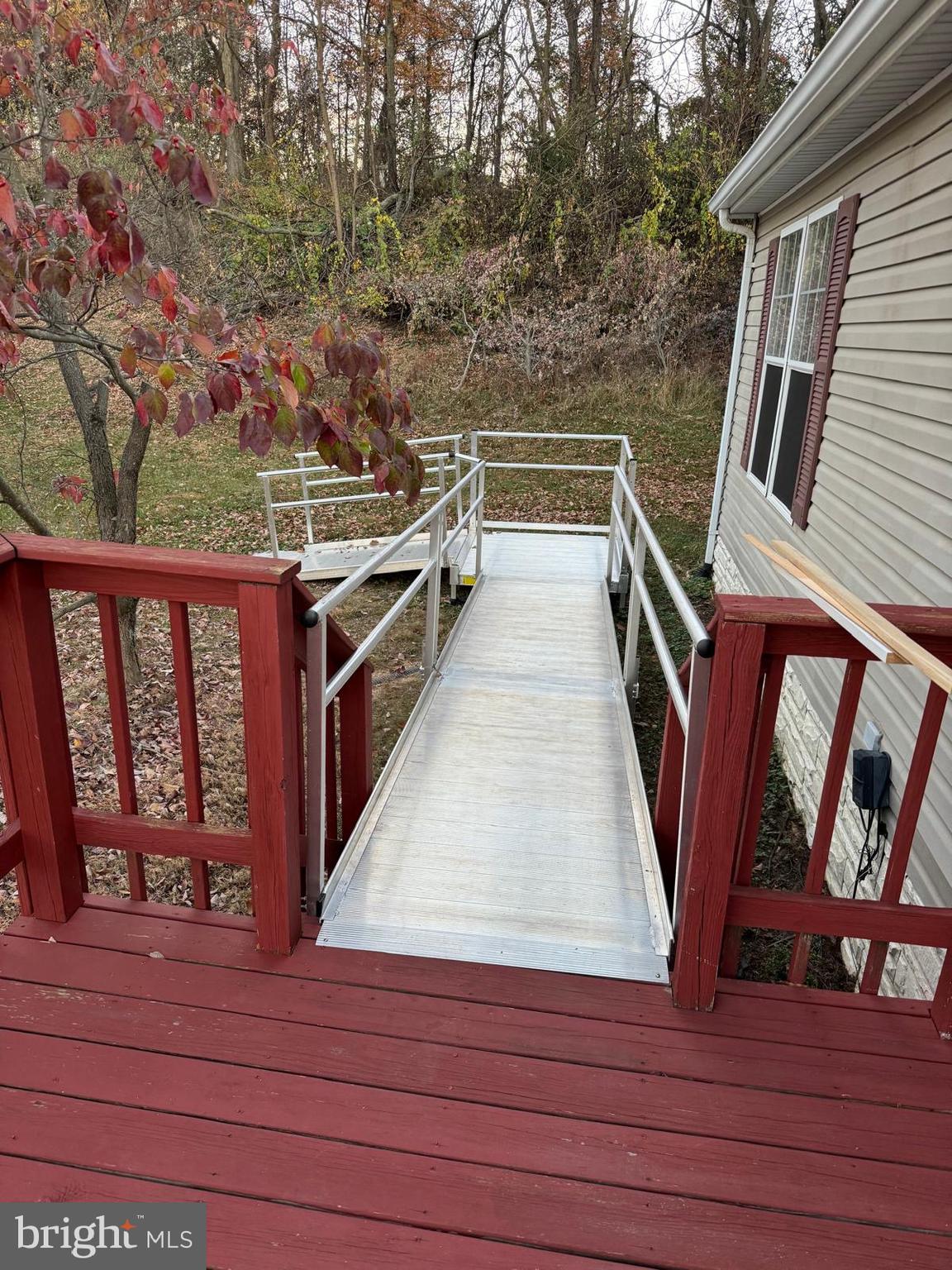 a view of stairs and wooden floor