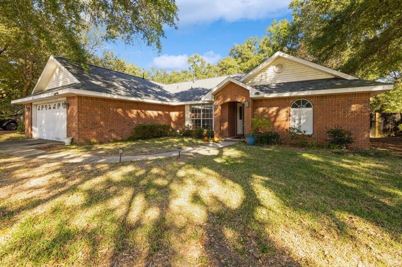 a front view of house with yard