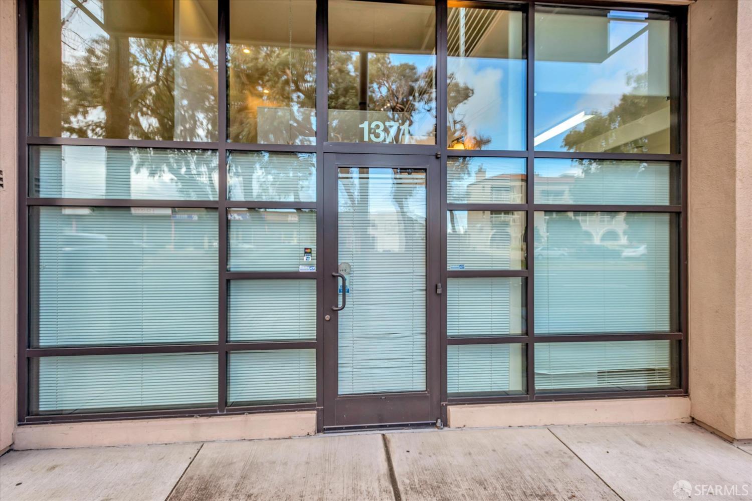 a glass door with glass door