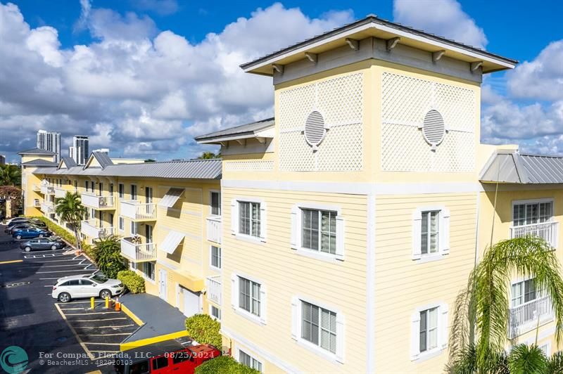 a front view of a building with balcony