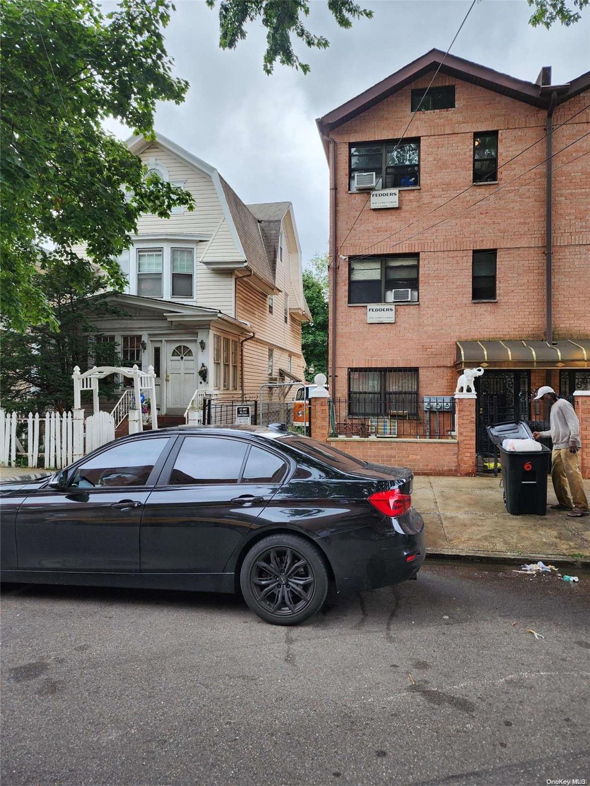 a car parked in front of a house