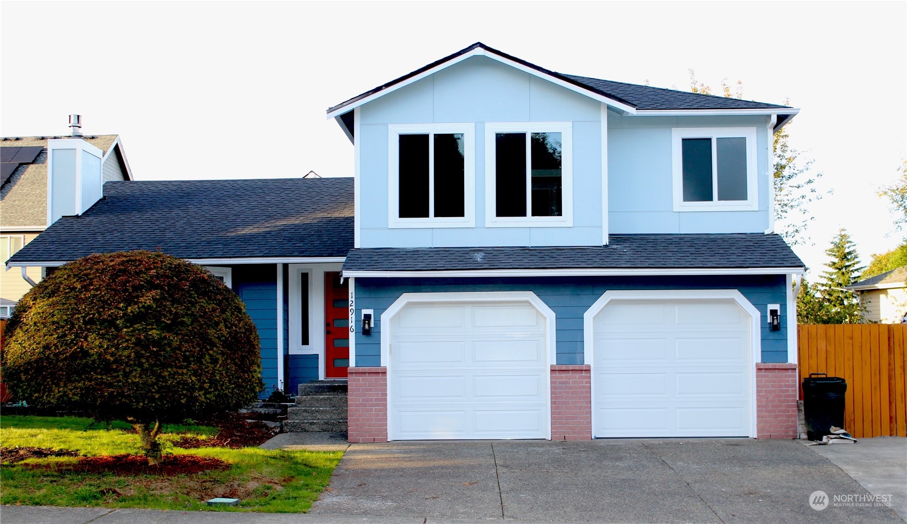 a front view of house with yard