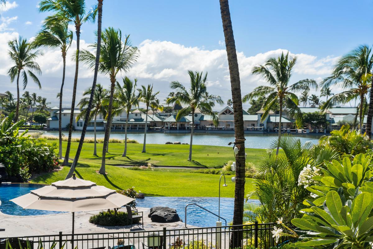 View of pool, golf coarse, serene Kings' Lake with koi fish, and Kings' shops from your lanai.