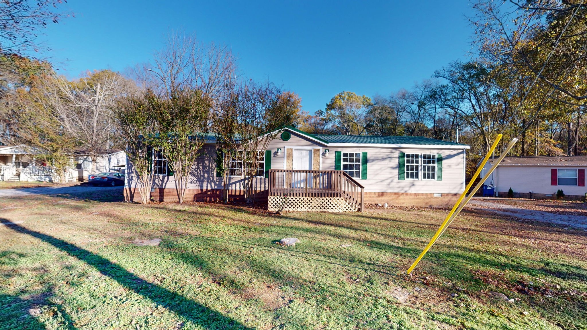 front view of a house with a big yard