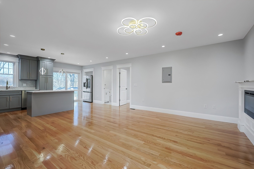 a view of kitchen with wooden floor