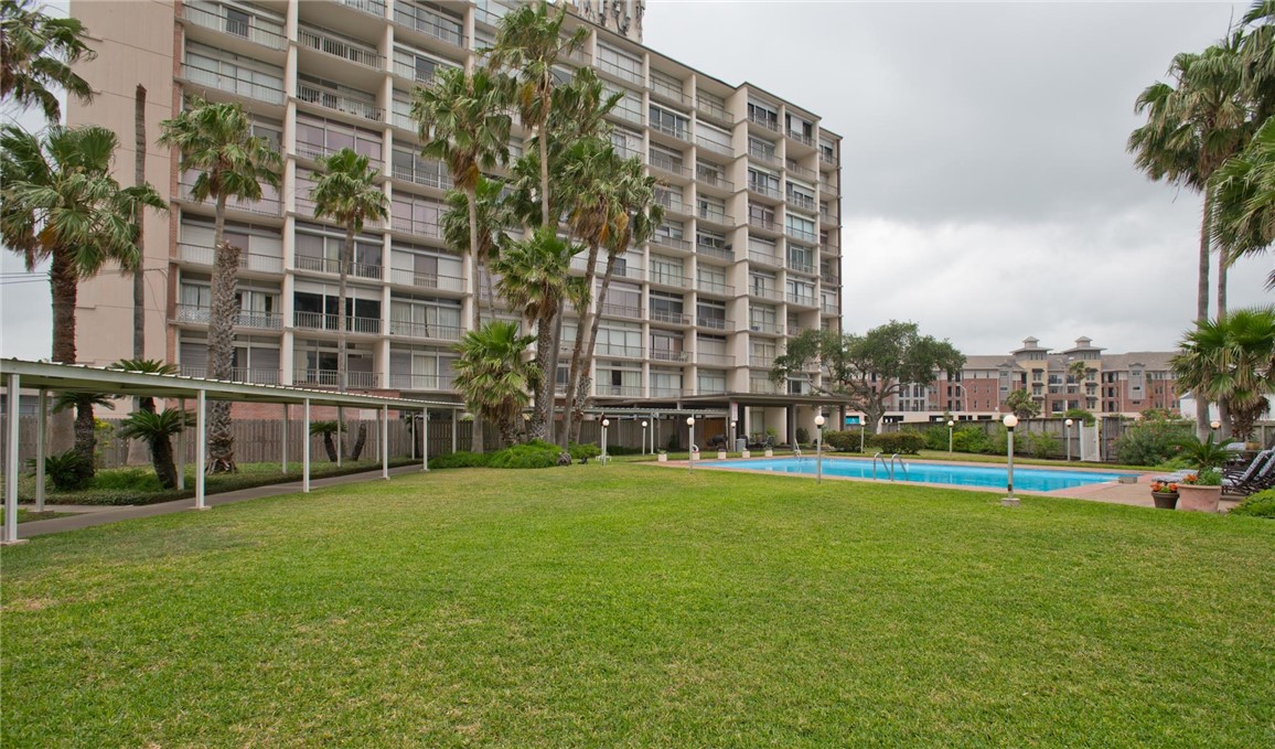 front view of a building with a yard