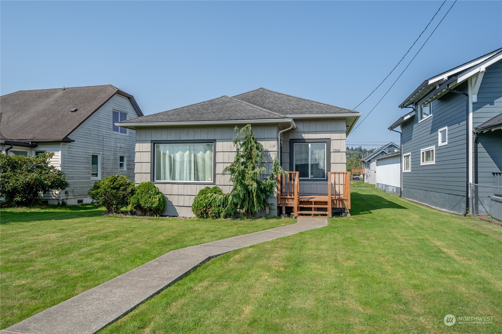 a house view with a garden space