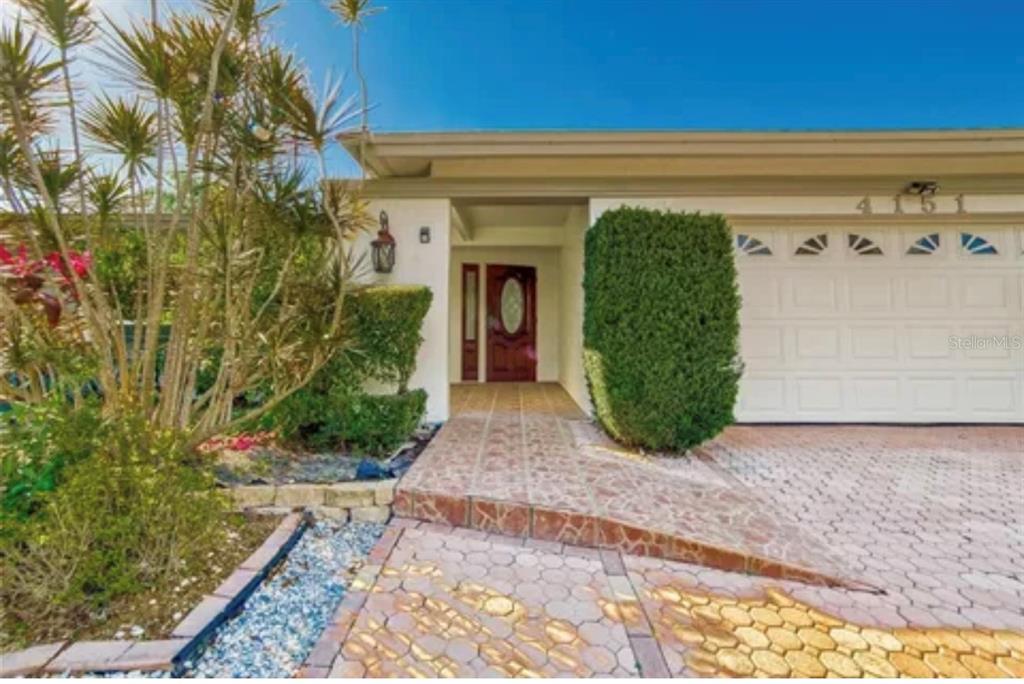 a view of a entryway door front of house