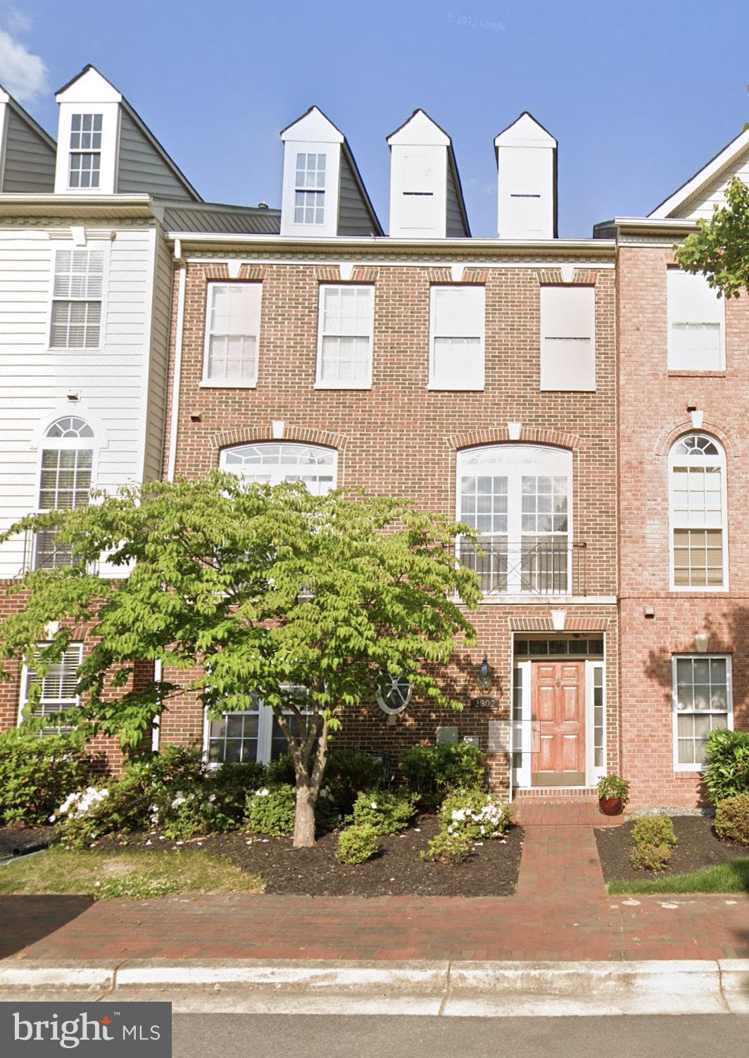 front view of multiple houses