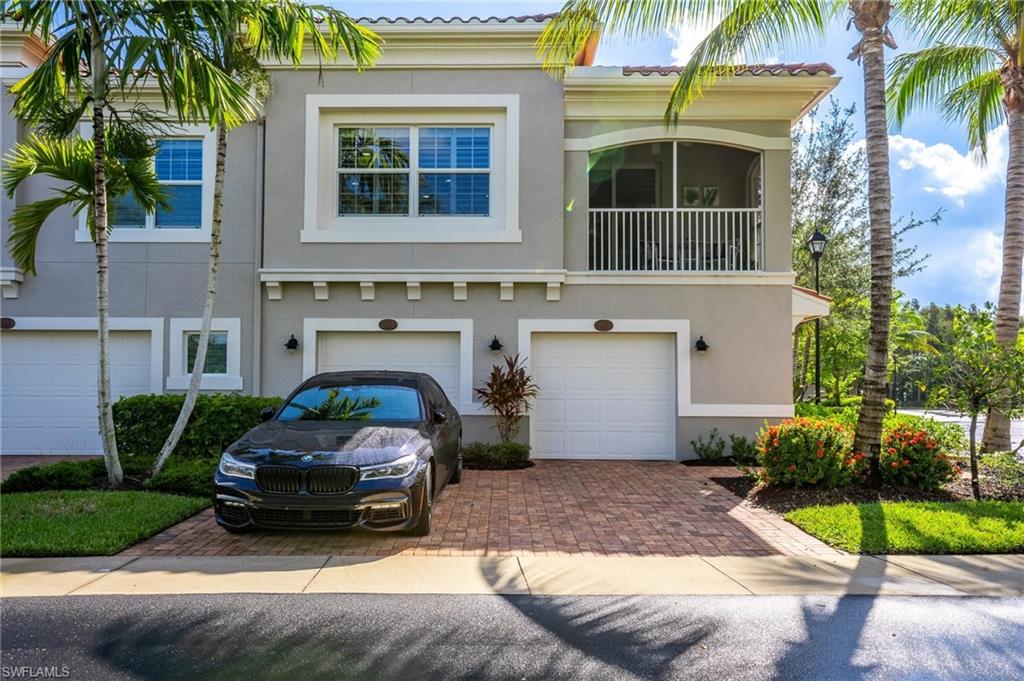 a car parked in front of a house