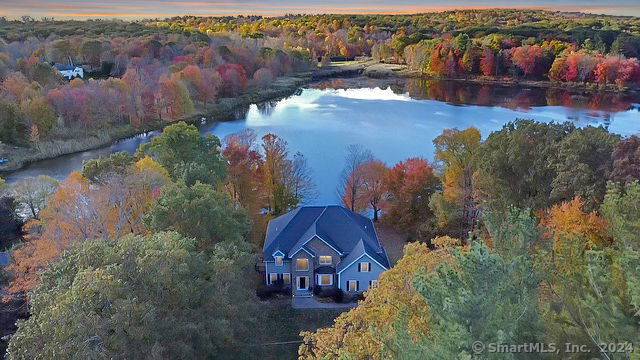 an aerial view of houses with yard