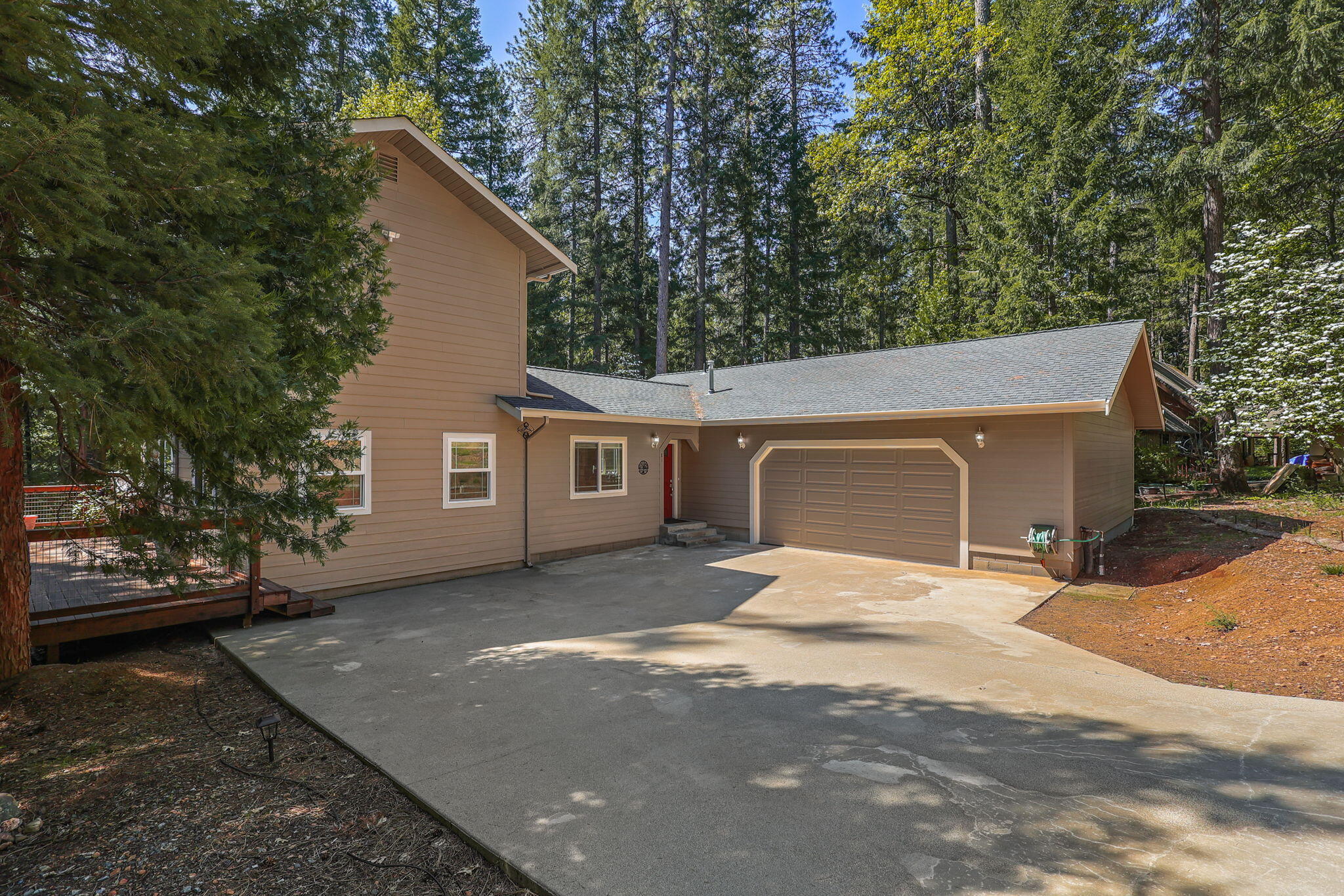 a front view of a house with yard