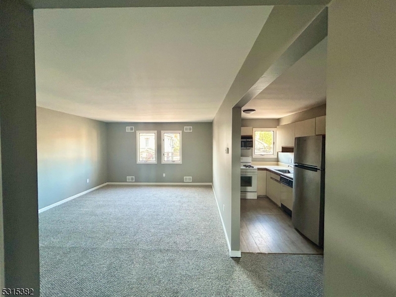 a view of a kitchen and a sink