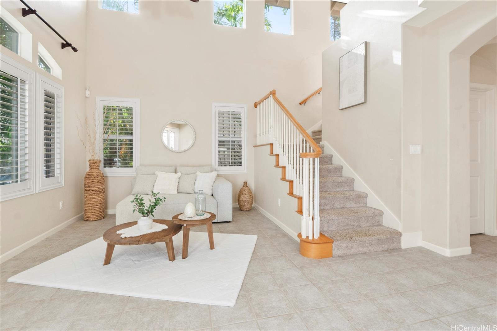 a living room with furniture and a table