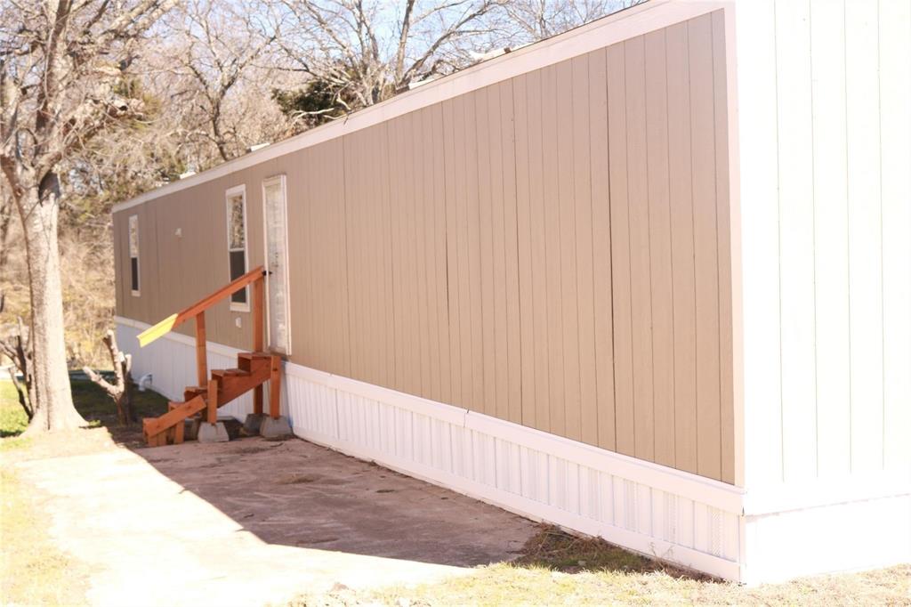 a view of a back yard of the building