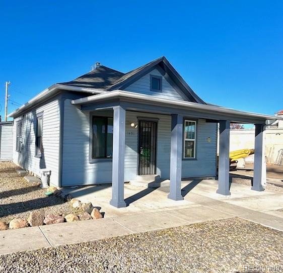 a front view of a house with a outdoor space