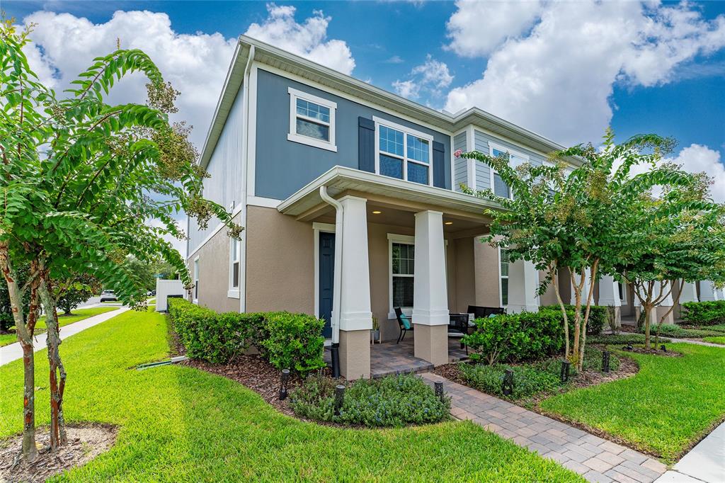 a front view of a house with a yard