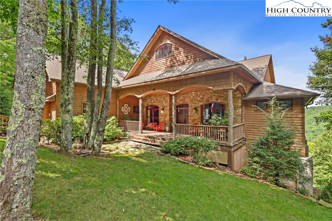 front view of a house with a garden