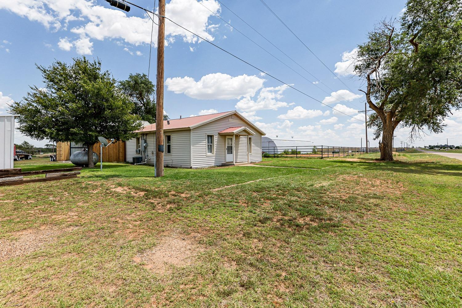 a house view with garden space