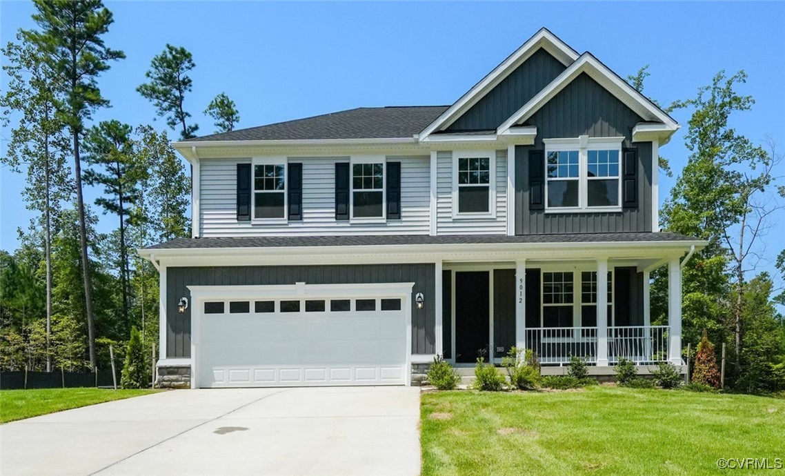 front view of a house with a yard