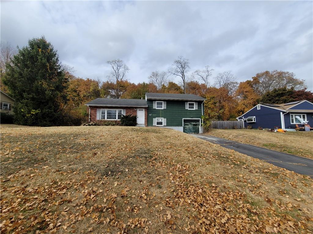 front view of a house with a yard