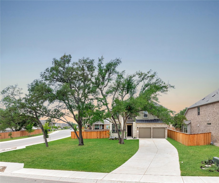 a view of house with yard