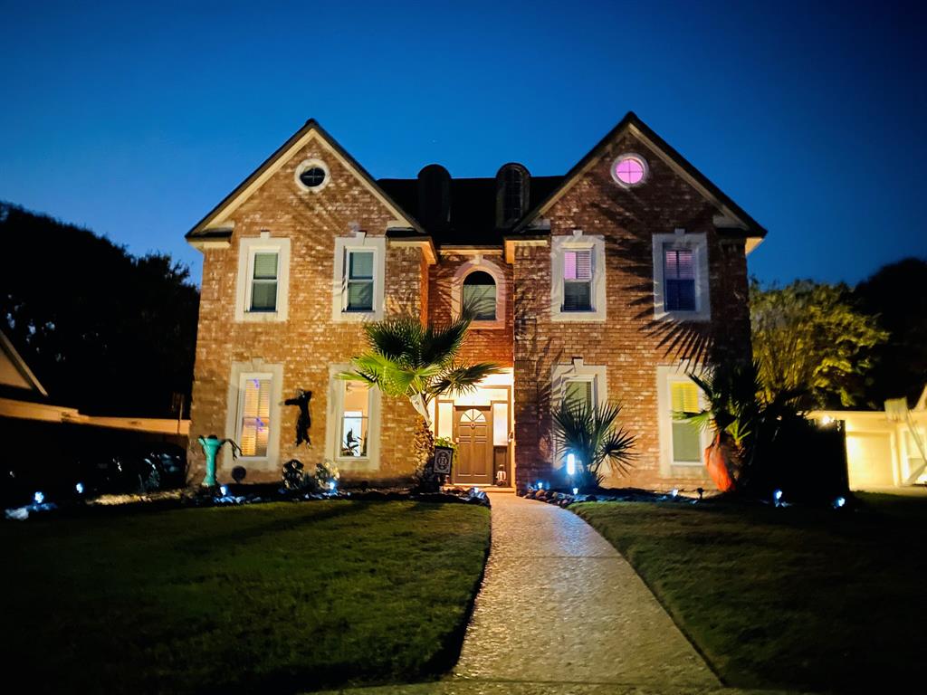 a front view of house with a yard