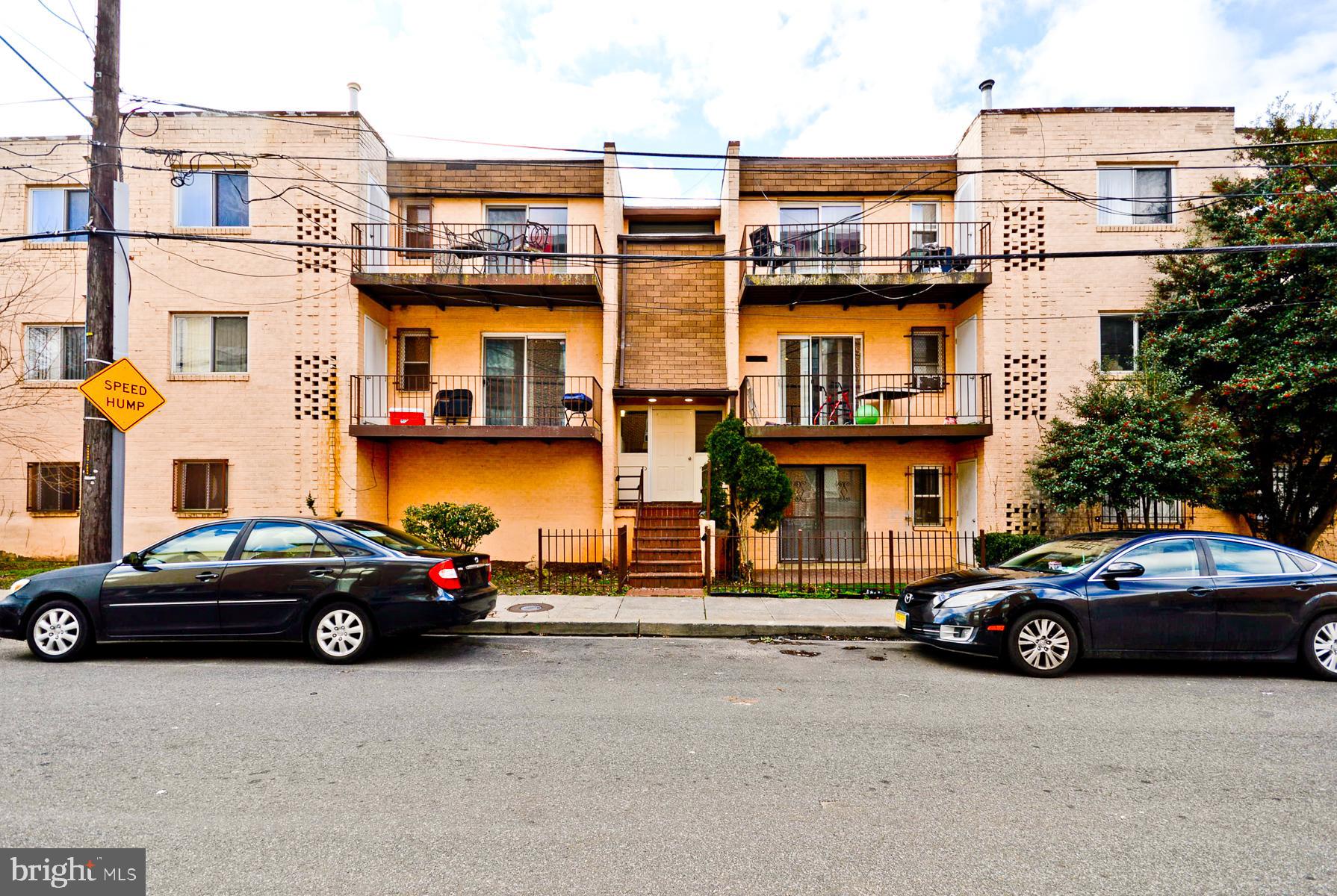 a cars parked in front of a building