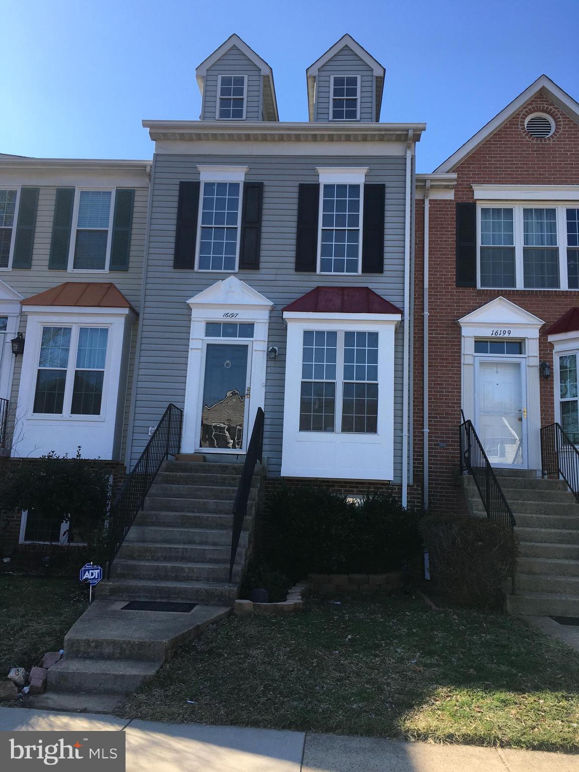 a front view of a house with windows