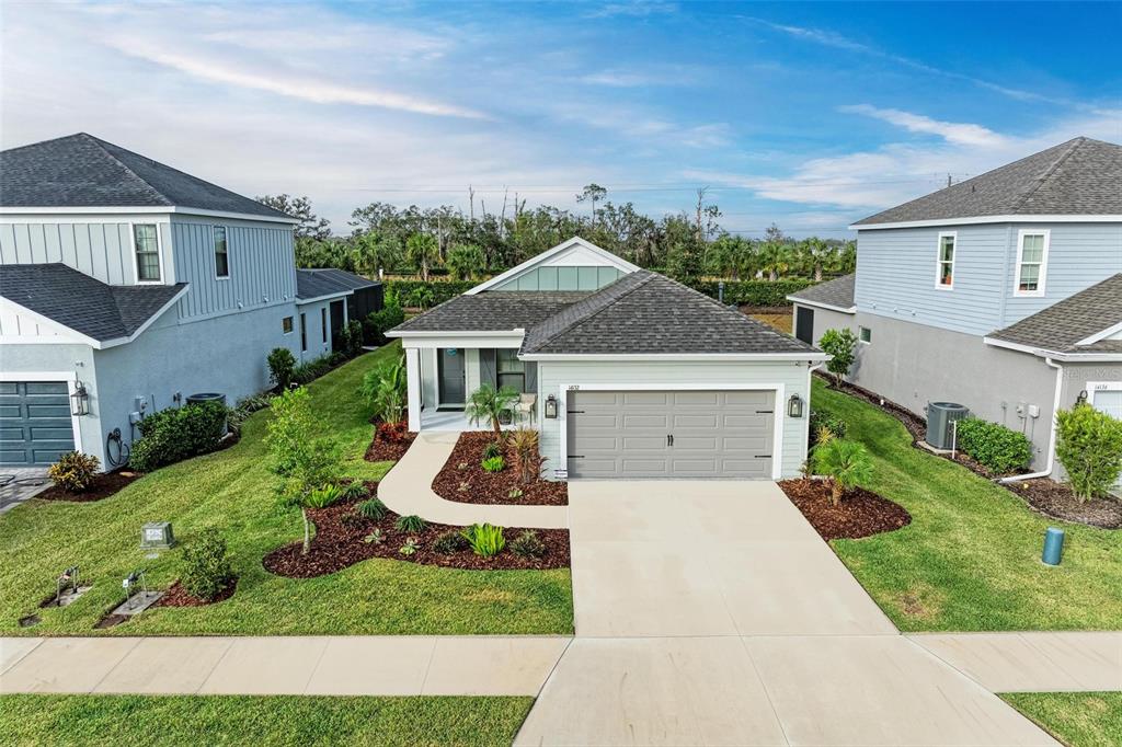 front view of a house with yard