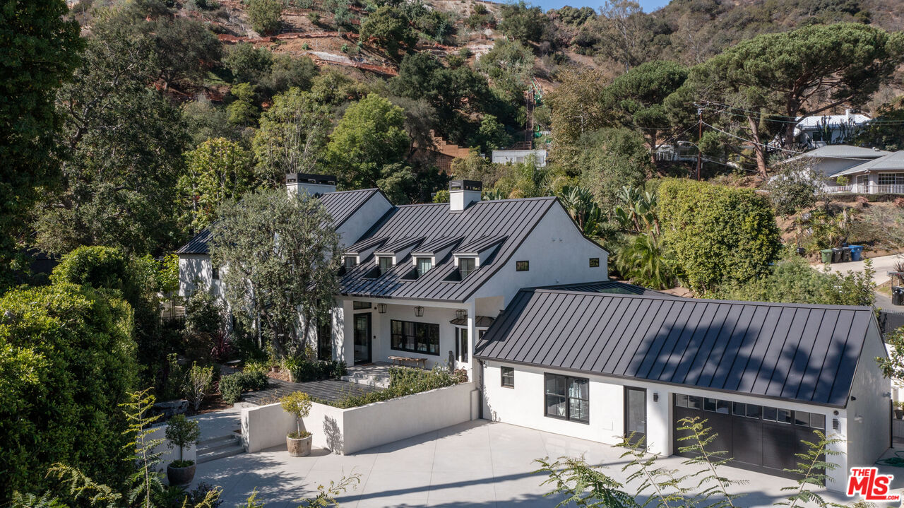 an aerial view of a house roof deck