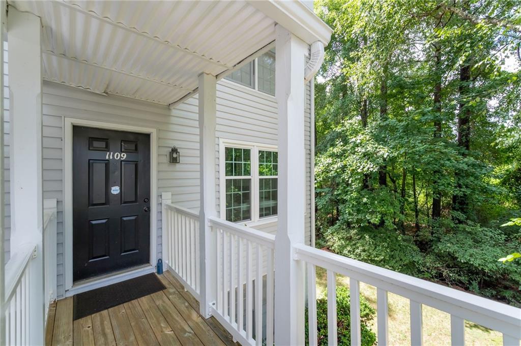 a view of a house with a porch