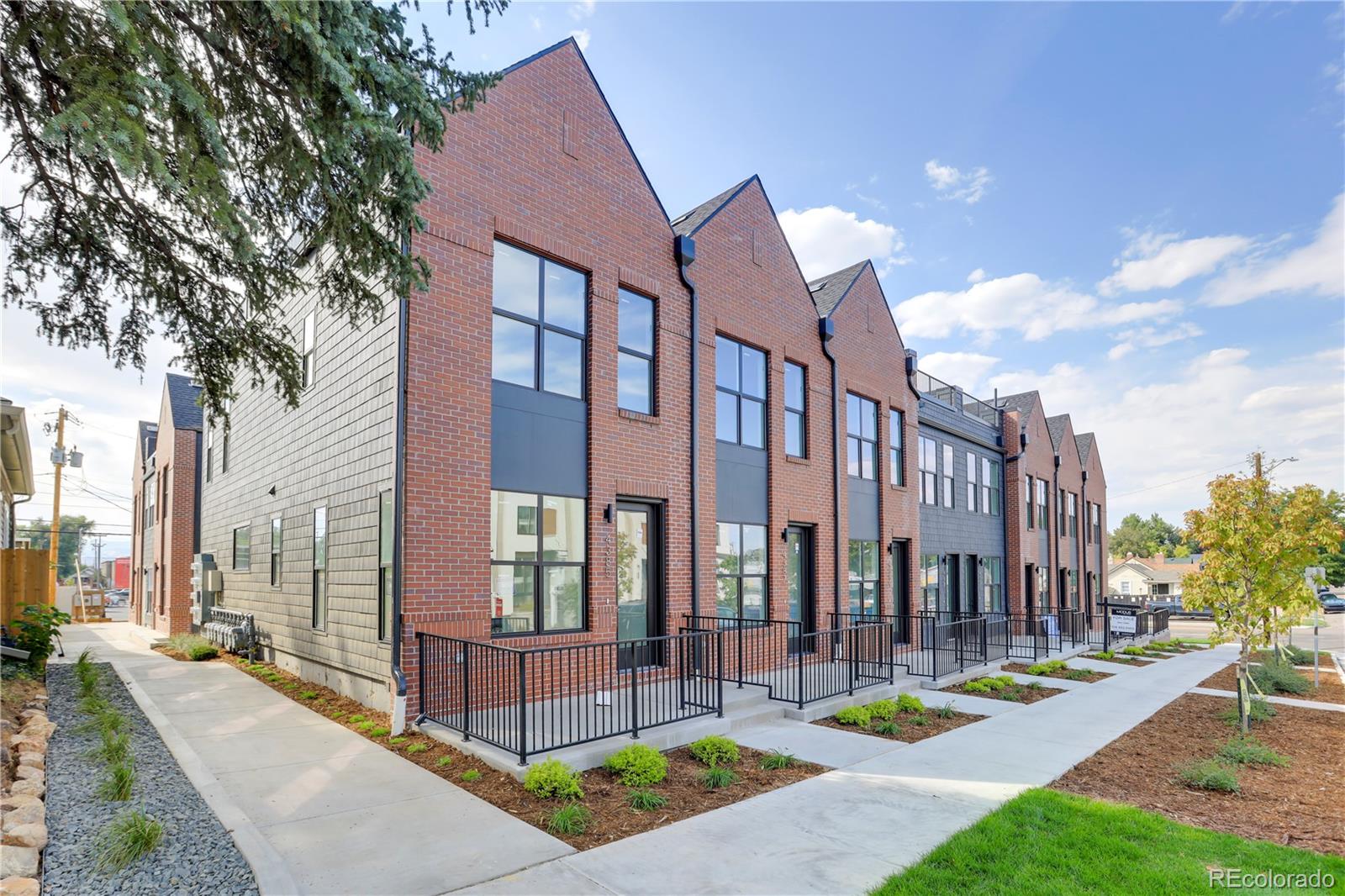 a view of a building with a yard